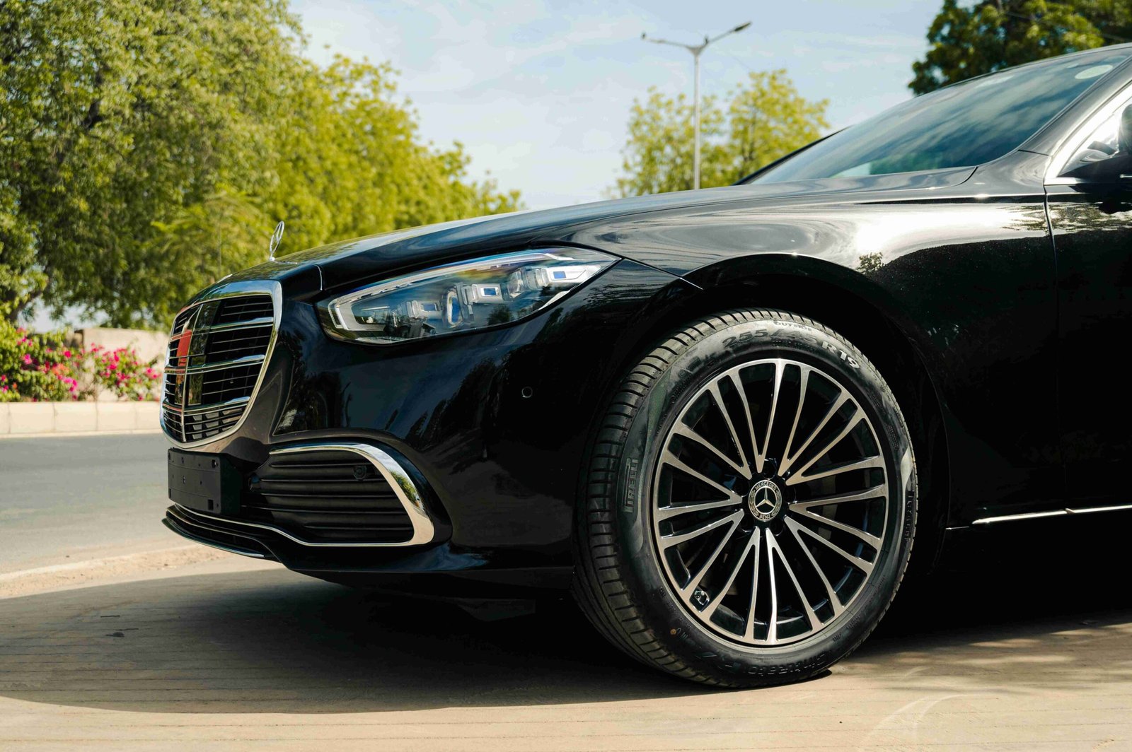Close-up of a luxury Mercedes used for executive private driver rides.